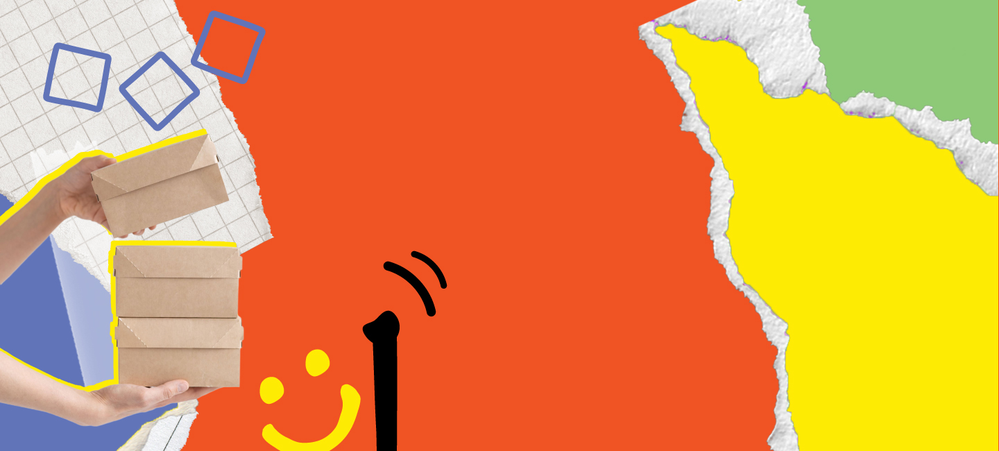 Mãos a agarrar caixas de encomendas